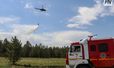 Аккулы укрыли водной завесой с вертолётов для условного пожара
