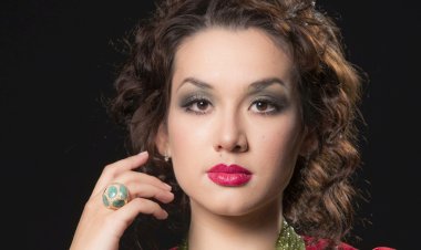 Асаин Байханов поздравил Марию Мудряк с заслуженной наградой